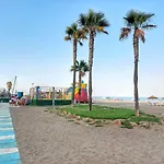 In Malaga Sun & *